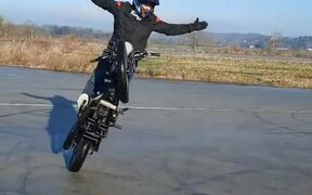 Guy Moves Motorbike in Circular Motion