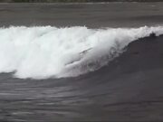 Man Rides Strong Waves in Kayak