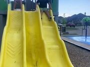 Kid Struggles on Bumpy Slide and Falls to Ground