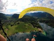 Person Goes for Paragliding Near Lake Bohinj