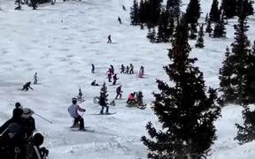 Skier Collides With Another and Falls