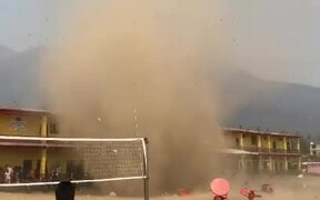 Dust Devil Rips Through School's Playground