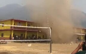 Dust Devil Rips Through School's Playground