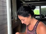 Woman Feeds Rescued Bird at Home