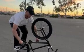 Guy Pedals With Hands While Riding Upside Down
