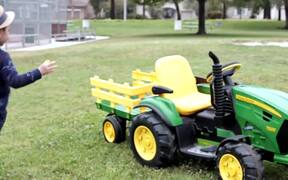 Kid Collects Dandelions in His Toy Truck From Park