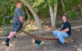 Father Flips and Falls Off Seesaw 