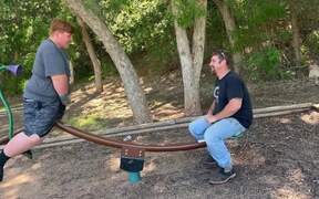 Father Flips and Falls Off Seesaw 