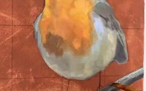 Artist Paints Robin Bird on Canvas