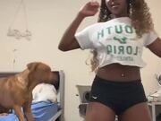 Dog Grabs Woman's Hair to Stop Her Dancing