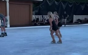 Figure Skaters Perform Synchronised Skating