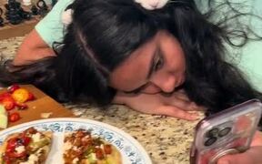 Cat Sits on Girl's Head and Watches Her Phone
