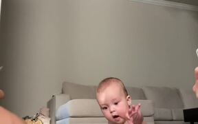 Baby Wins While Playing Card Game With Parents