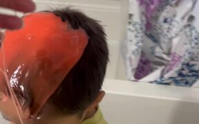 Kid Puts Slime Gel Over His Head