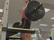 Man Does Weightlifting While Balancing on Board