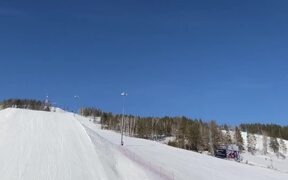 Person Attempts Snowboard Trick and Fails