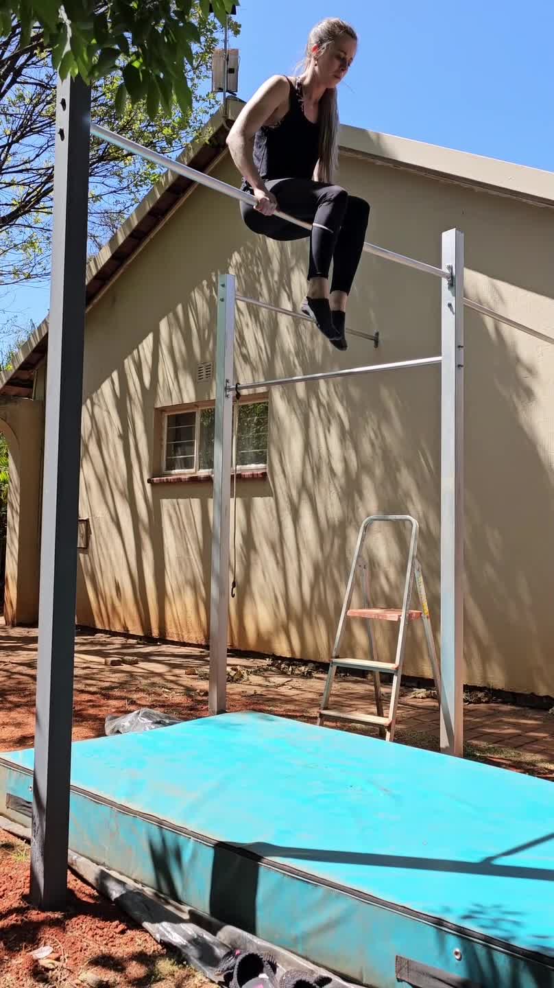 Woman Falls Face First Onto Bed While Calisthenics