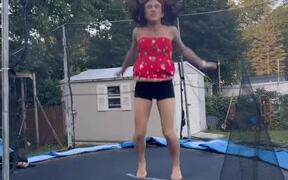 Woman Falls on Her Back After Backflipping