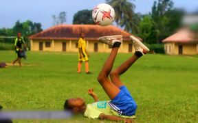 Kid Juggles Soccer Ball Effortlessly