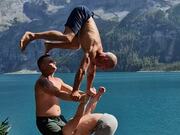 Three Men Create Iconic Acrobatic Formation