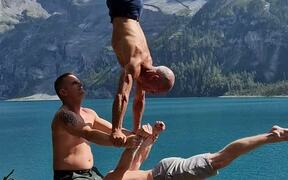 Three Men Create Iconic Acrobatic Formation