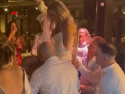 Bride Sitting in Chair Falls When People Lift It 