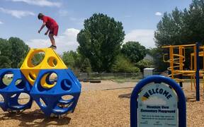 Kid Performs Backflip Off Climbing Structure