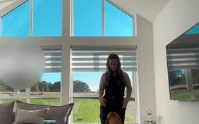 Woman Dances Happily With Dog