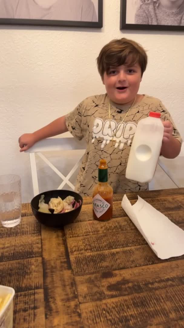 Boy Pukes in Seconds After Drinking Hot Sauce