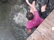 Man Slips and Falls Into Water