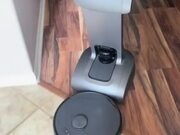 Robot Butler Attacks Robot Vacuum Cleaner