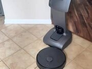 Robot Butler Attacks Robot Vacuum Cleaner
