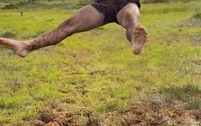 Man Hilariously Does Weird Jump Tricks in Mud