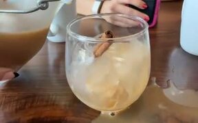 Person Spills Drink While Pouring it