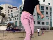 Woman Performs Bouncing Tricks on Slackline