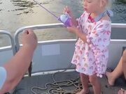 Little Girl is Excited to Catch Her First Fish