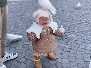 Kid Gets Startled When Pigeon Perches on Her Head