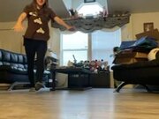 Girl Practicing Handstands in Room Falls Down