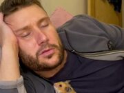 Hamster Naps Next to Owner Inside His Jacket
