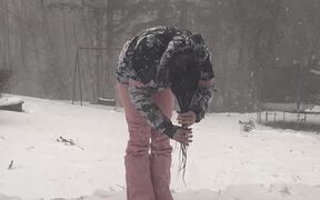 Woman Freezes Hair in Blizzard