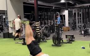 Guy Does Funny Dance at Gym After Doing Handstand