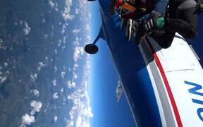 Skydivers Jump Out and Attempt Unique Trick