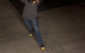 Woman Tries Her Best to Keep Balance But Falls