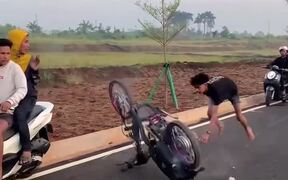 Uncontrolled Motorcycle Hits Scooter