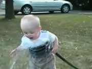 Kid Tries to Drink Water