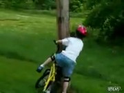 Little Kid on Bike Rides Into Pole