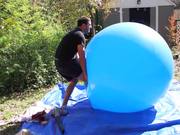 Slow Mo Guys Popping Huge Balloon