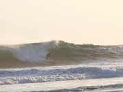 Slow Motion Shot of a Man Surfing