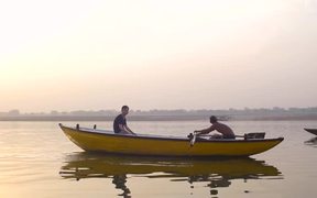 Boat Being Rowed Down River Ganges - Fun - VIDEOTIME.COM