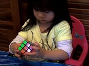 2 Year Old Girl Solves Rubiks Cube